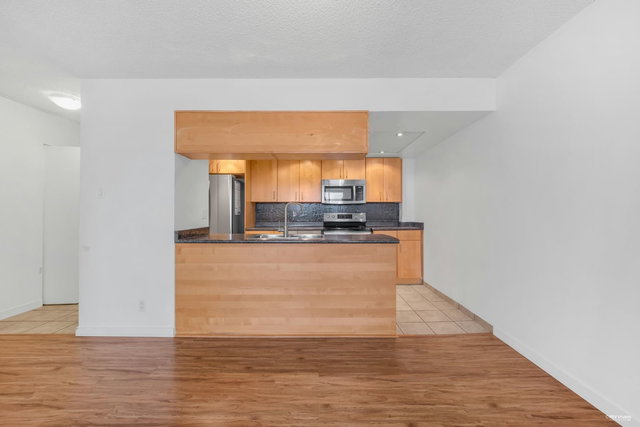 2402 - 9521 Cardston Court