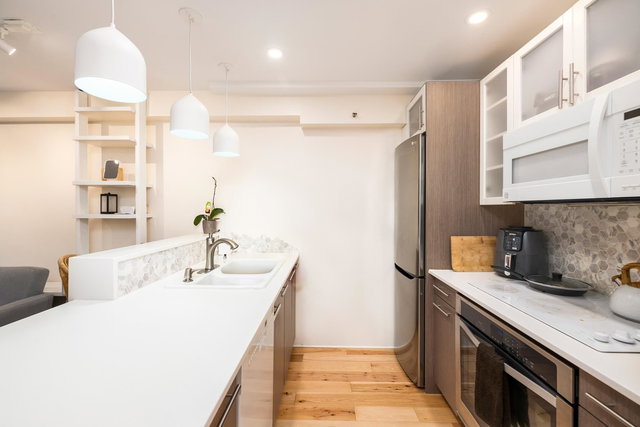 112 - 825 7th Avenue E