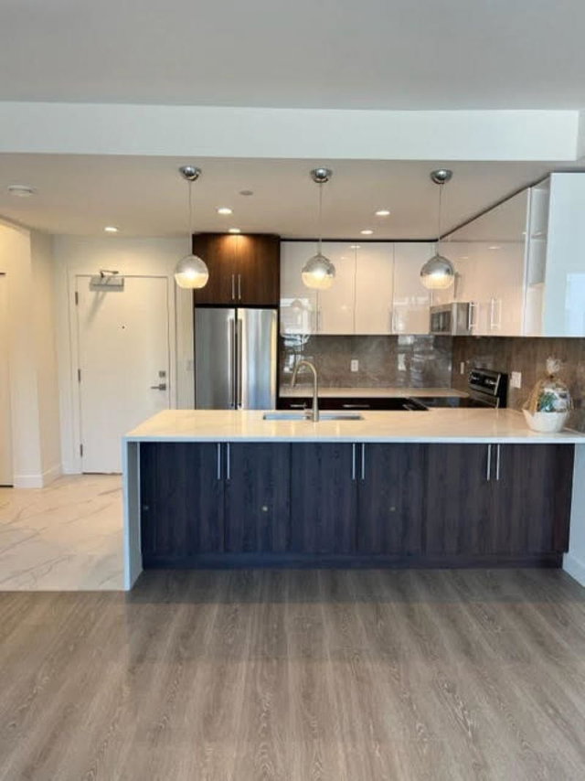 207 - 11703 Fraser Street