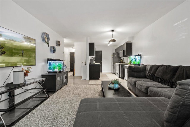 111 - 7694 Evans Road