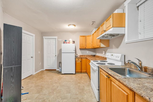 BSMT - 18991 70a Avenue