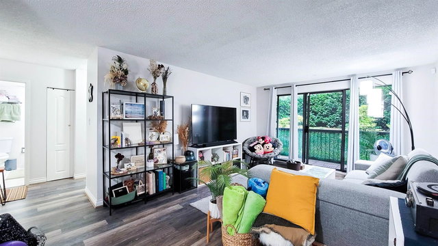 107 - 620 Eighth Avenue