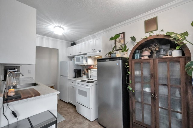 103 - 214 15th Street E