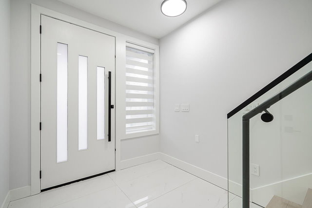 101 - 16649 18a Avenue