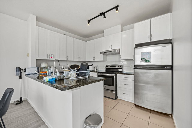 1802 - 6823 Station Hill Drive