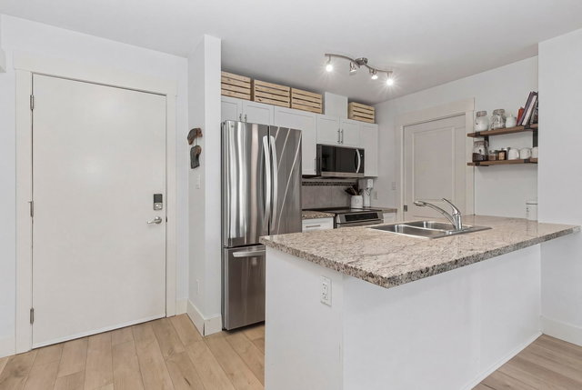 217 - 1211 Village Green Way