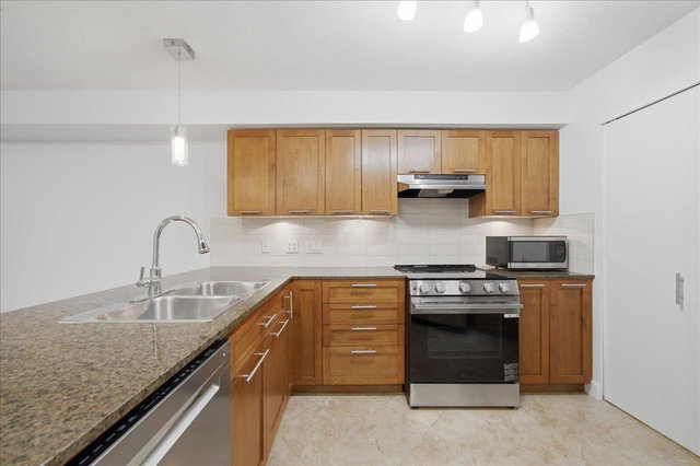 103 - 19673 Meadow Gardens Way