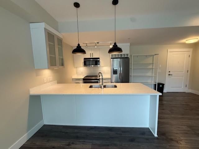 210 - 22327 River Road