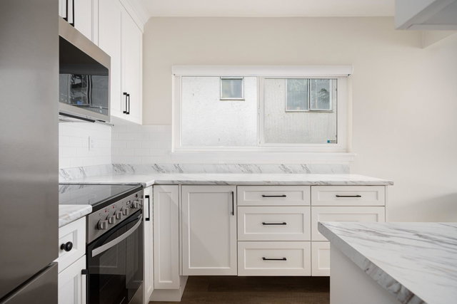 7 - 1445 11th Avenue W