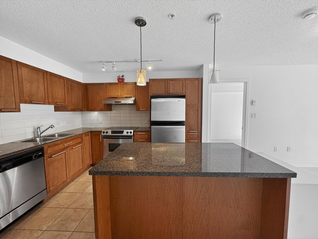 207 - 19673 Meadow Gardens Way
