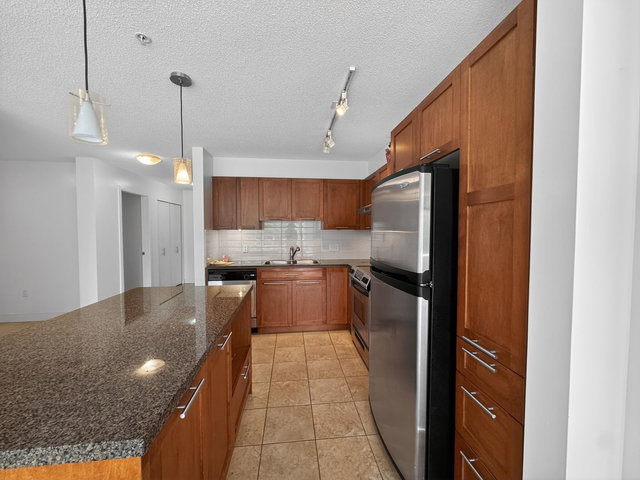 207 - 19673 Meadow Gardens Way