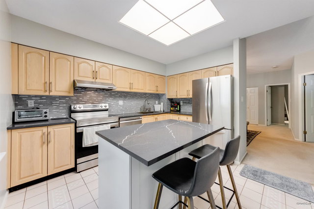 202 - 5885 Olive Avenue