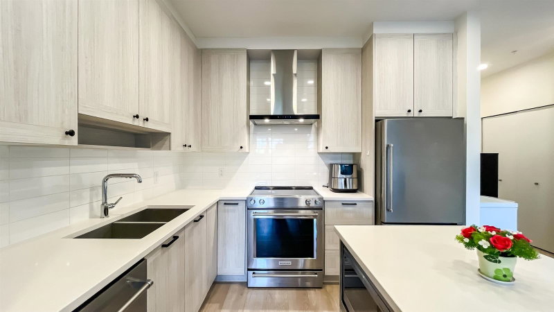 102 - 7133 14th Avenue