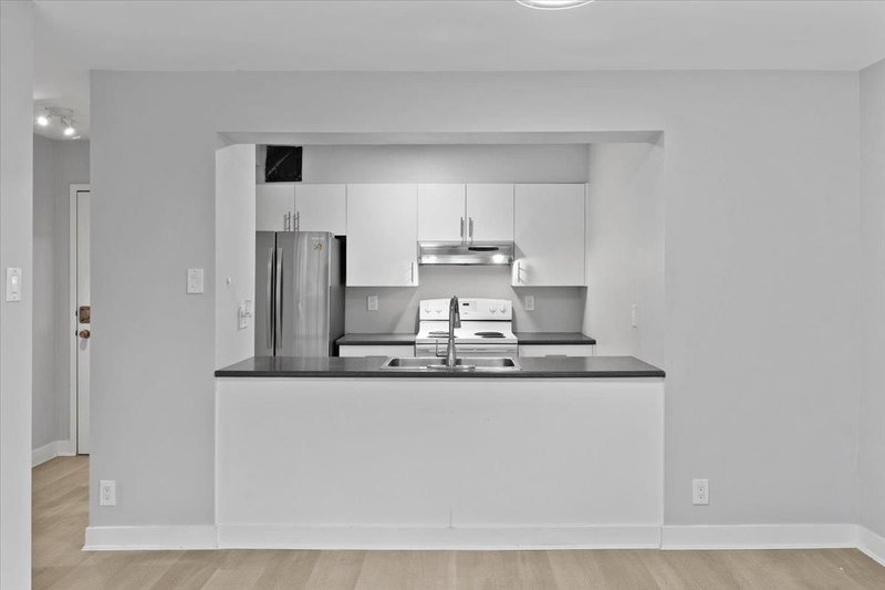 403 - 9521 Cardston Court