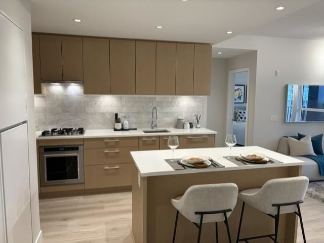 401 - 110 17th Street E