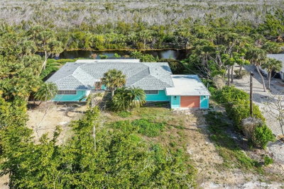 1057 BLUE HERON Drive, Sanibel, FL, 33957 — photo 2