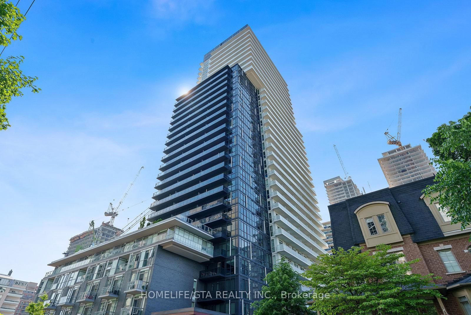 AVAILABLE ASAP! FRESHLY PAINTED & PROFESSIONALLY CLEANED! In the Heart of Midtown! Welcome to 101 Erskine by Tridel! This 2 Bedroom/2 Bathroom suite offers  831sqft of living space with North East Views and of the Outdoor Pool! AND A LARGE BALCONY!   This suite has laminate flooring throughout, linear kitchen with s/s and built in appliances, quartz kitchen countertop & backsplash, under-mount stainless steel sink. Open concept living dining area with a walk out to the balcony. Primary Bedroom offers a 4 pc ensuite + walk in closet. The 2nd bedroom is well sized and has a closet. Long hallway perfect for storage and privacy. 3 Pc bath is adjacent to the 2nd bedroom, ensuite laundry is included. One parking spot & Locker is included.