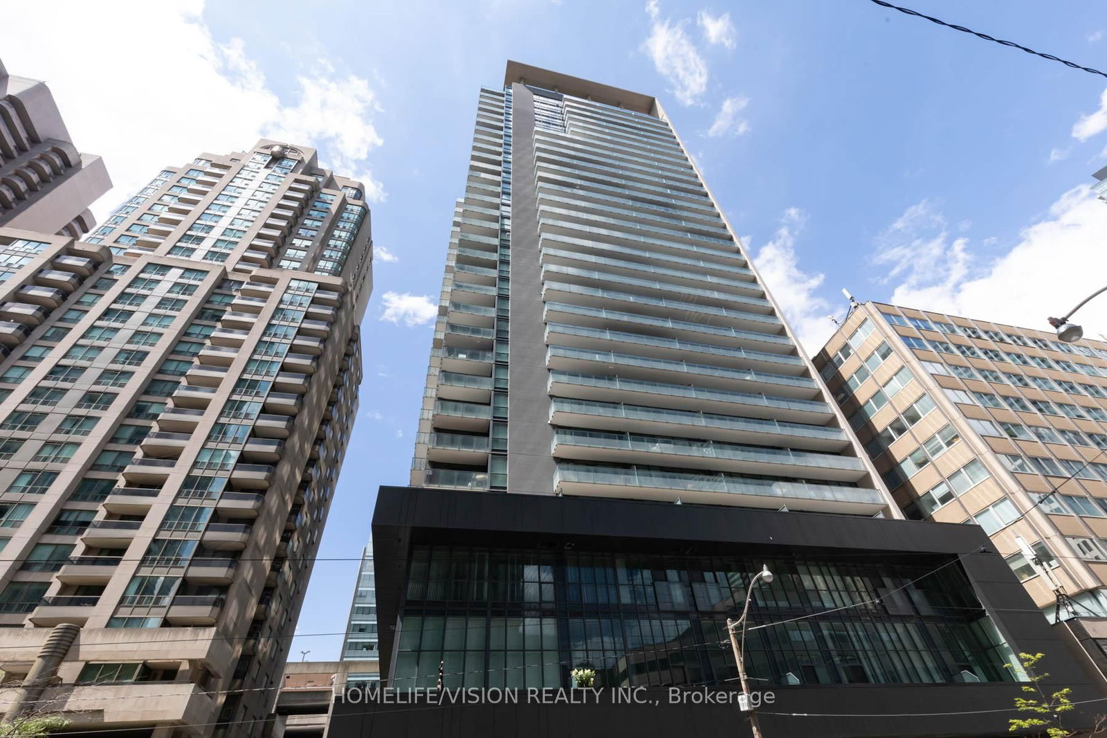 Welcome to 770 Bay St! Lumiere Condo, Built By Menkes Features a Gorgeous Open 1 Bedroom Layout + Locker.  Situated in the heart of Downtown Toronto on Bay Street, this condo is Perfect For The Young Working professional or University Student Beginning Their Studies.   This beautiful suite Is Approx. 545SF,  featuring Soaring 9