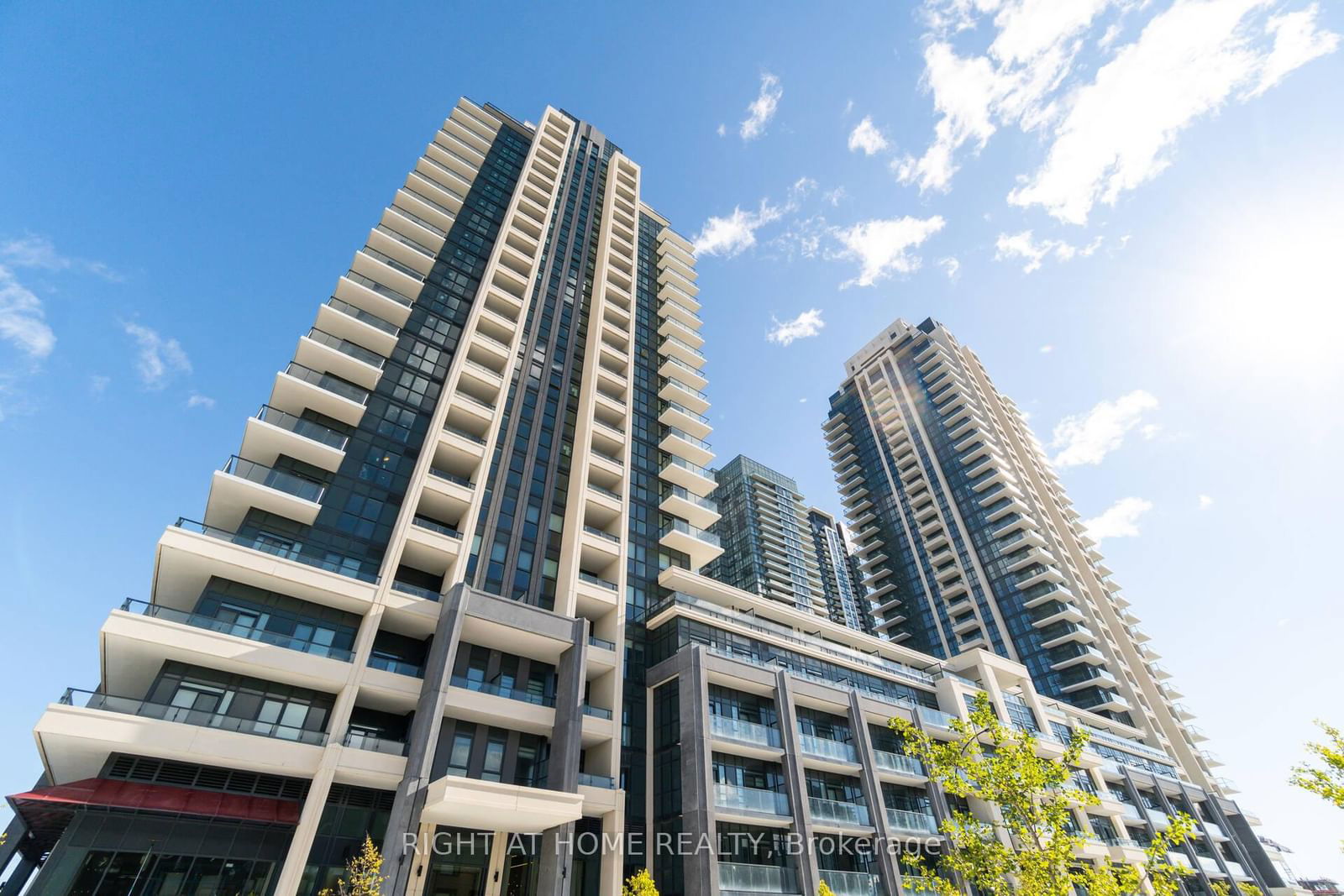 Stunning 1 Bed + Den Unit In The Heart Of City Centre. Close To 1000 Sqft. Of Living Space In The Most Desirable Location Of Downtown Mississauga.  Featuring A Rare Layout Consist Of 10 Ft Ceiling And A Massive 415 Sqft Terrace For Your Enjoyment. Open Concept White Kitchen With Granite Counter Top & Eat-In Island And Double Sinks.  Excellent Amenities Including Gym, Yoga, Theatre, Library And Much More.  Steps To Square One, YMCA, Sheridan College, Living Arts, City Hall, Centre Library, Public Transit & Easy Access To Major Hwys. **EXTRAS** Stainless Steel Appliances,  Freestanding Stove, Fridge, Dishwasher, Microwave, And Large Capacity Washer/Dryer.  All Electrical Light Fixtures And Window Coverings.  One Parking And One Locker Included.