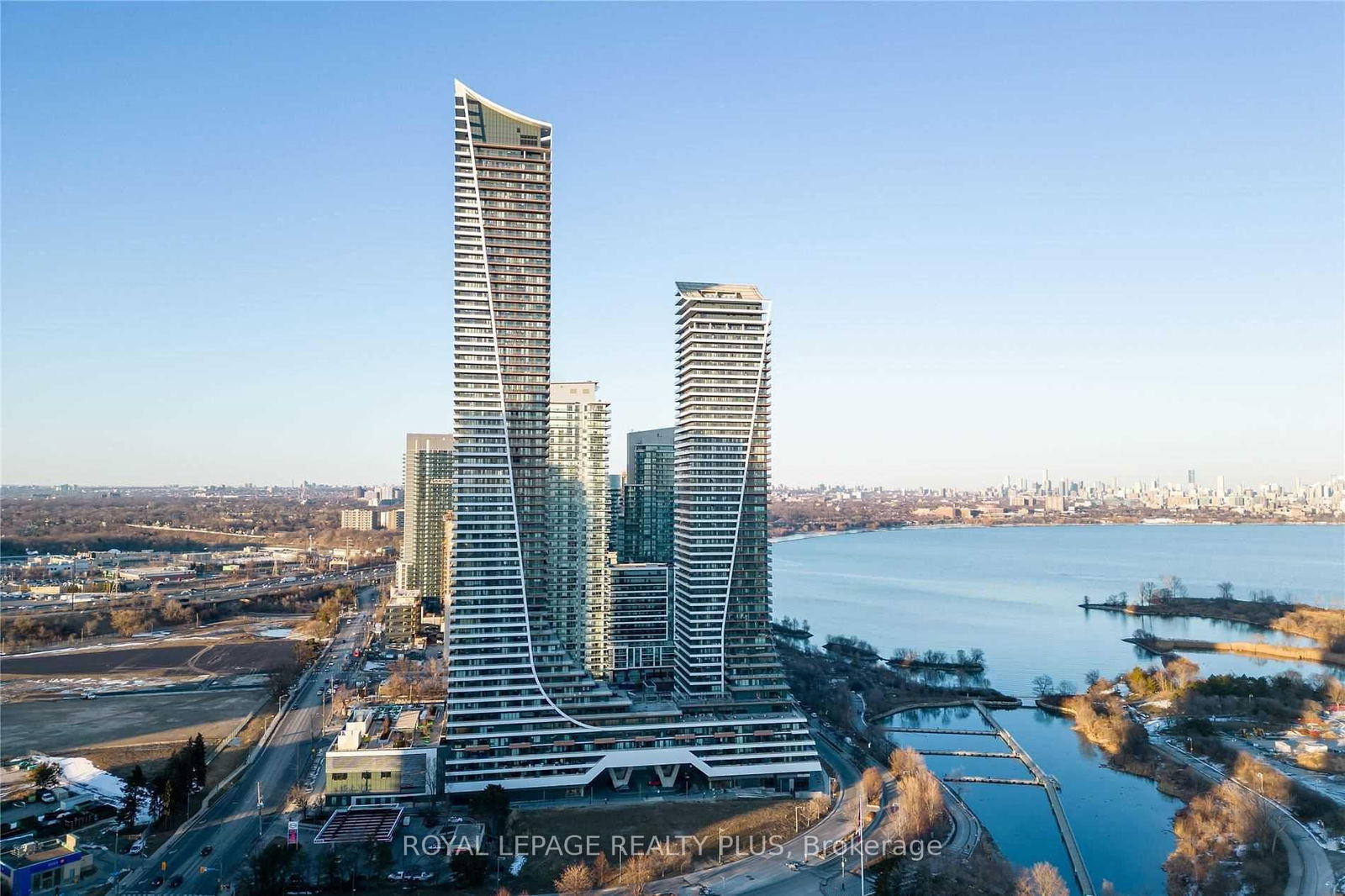 Experience breathtaking waterfront living at Eau Du Soleil!  Recently renovated, luxury 1-bedroom + den condo offers spectacular, unobstructed views of Lake Ontario, the marina, and the Toronto skyline.  With 627 sq. ft. of functional living space, 9 ft. ceilings, new appliances, granite countertops, and floor-to-ceiling windows, the open-concept layout includes a versatile den perfect for a home office.  Relax on the large balcony or enjoy 5-star amenities, including a saltwater pool, sauna, gym, yoga, and Pilates studio, terrace with BBQs, party lounge, theatre room, and guest suites.  Ideally located for Lakeside walks and just minutes away from transit, downtown, and highways.  2 lockers and upgraded parking for Electric Vehicle included.