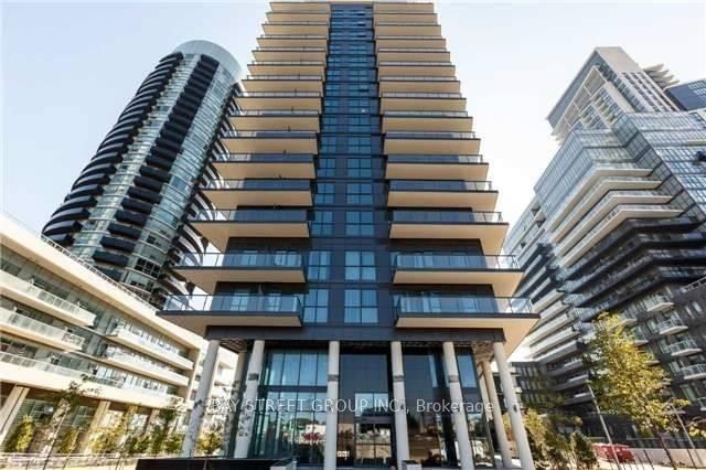 Experience luxurious lakefront living in this exceptional 1-bedroom condo at 39 Annie Craig Dr. Nestled in Torontos vibrant waterfront community, this unit boasts unobstructed views of the city and lake from a wraparound balcony. Floor-to-ceiling windows flood the open-concept living and dining areas with natural light, complementing the sleek, modern design. The kitchen features stainless steel appliances, elegant quartz countertops, making it both stylish and functional. The unit includes laminate flooring throughout, in-unit laundry, 1 parking space, and 1 locker for added convenience. Residents enjoy resort-style amenities, including a fitness center, indoor pool, sauna, rooftop patio, and 24-hour concierge services. Steps from Humber Bay Shores, waterfront trails, parks, top-rated restaurants, grocery stores, and cafes, with TTC access to the subway and easy access to the QEW, this is an unbeatable location for professionals and couples seeking an upscale waterfront lifestyle.