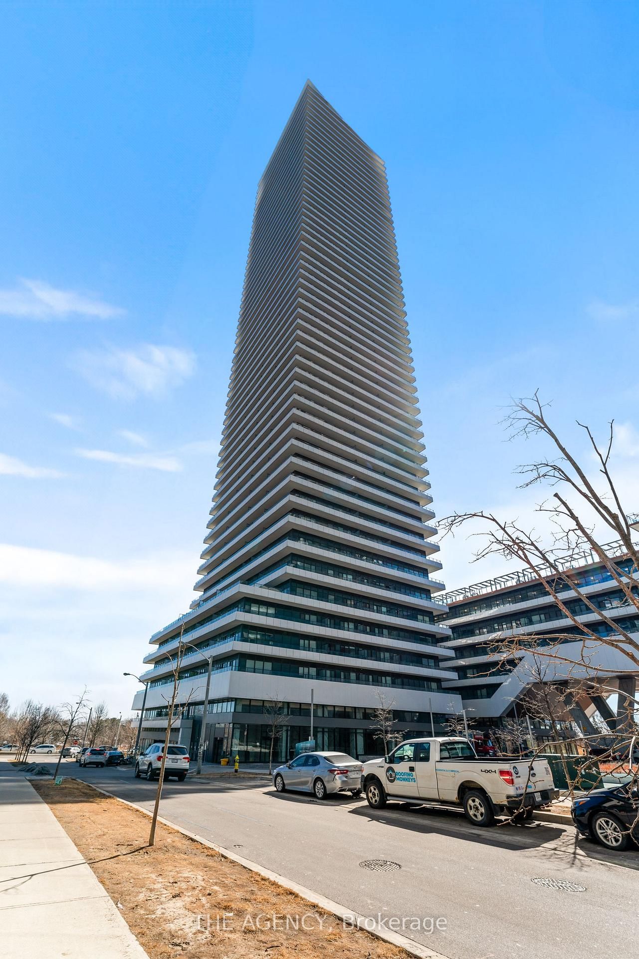 A Hidden Gem in the Heart of the City! This stunning 2-bedroom + den residence is a masterpiece in the sky. Enjoy breathtaking lakeside views from your private 750 sq. ft. terrace your personal oasis in the city. Designed for those with a refined taste, upgrades. Featuring a gorgeous custom kitchen, thoughtfully designed storage and shelving in all closets, and a striking brick electric fireplace with a live-edge mantel. Experience sophistication at its finest view!